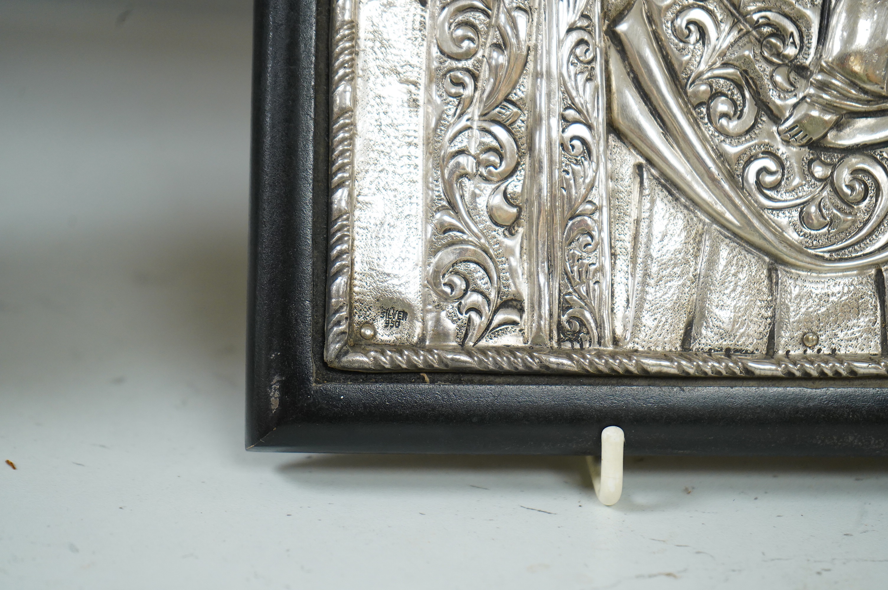 A Greek silver Icon Madonna and child, the oklad stamped silver 950, and a smaller similar enamel panel on copper, icon 31cm high